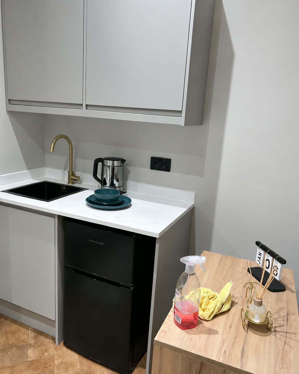 Clean, tidy studio kitchen after a clean by Ipswich Maid