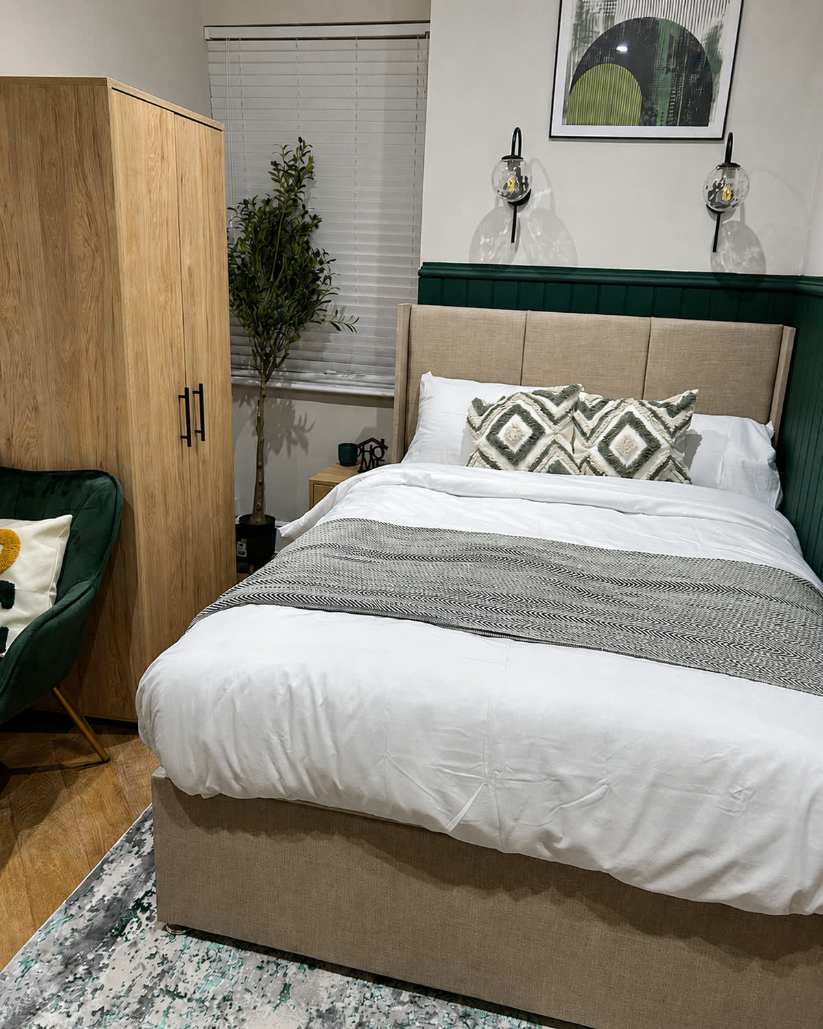 Freshly made bed in a clean, tidy bedroom after a domestic clean